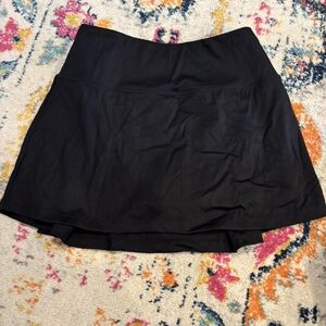 Black sporty skort with zipper pocket